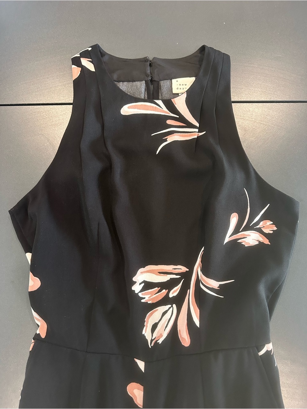 Black Floral Sleeveless Jumpsuit with Blush-Peach Accents